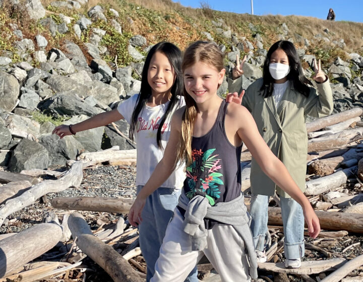 WCRA students walking on a beach